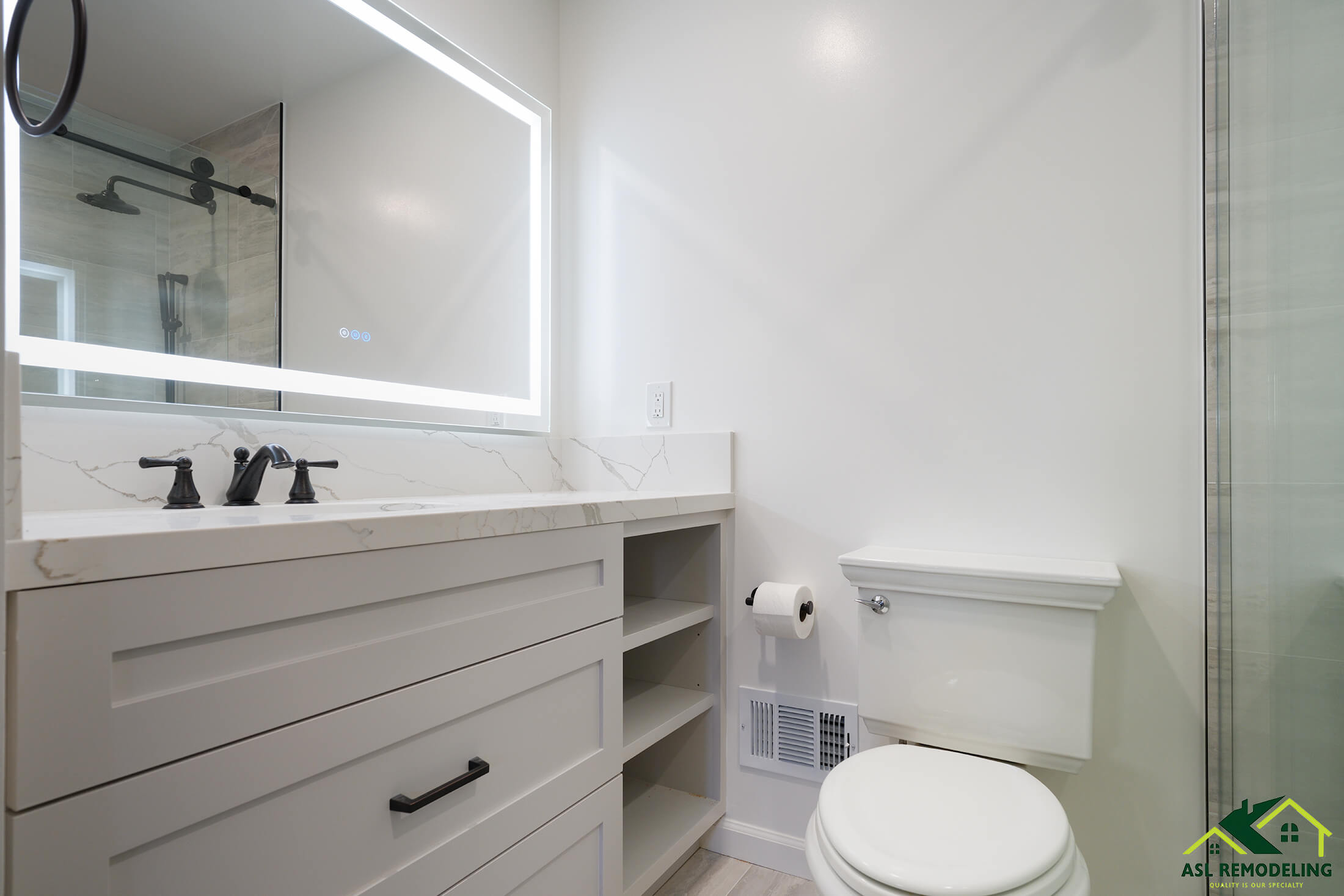 ADU bathroom remodel in Cupertino with floating vanity, LED mirror, and quartz countertop